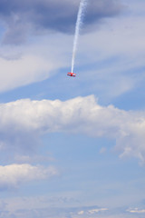 A plane performing in an air show