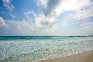 Waves on beautiful golden beach