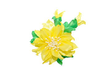 Kanzashi. Yellow artificial flower isolated on white background