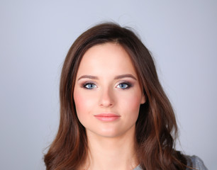 Portrait of an attractive fashionable young brunette woman