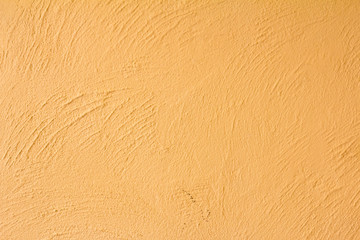Fototapeta na wymiar Orange color concrete wall background
