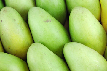 close up on fresh green mango background