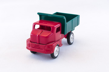 Vintage toy dump truck isolated on white background © Don