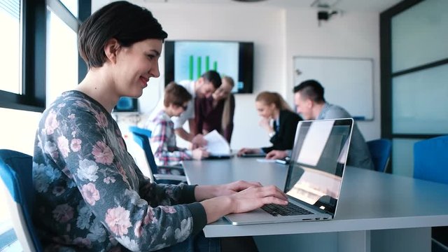 Presenting crowdsourcing plan idea to tech startup investors in trendy office