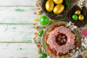 Easter cake, flowers and eggs