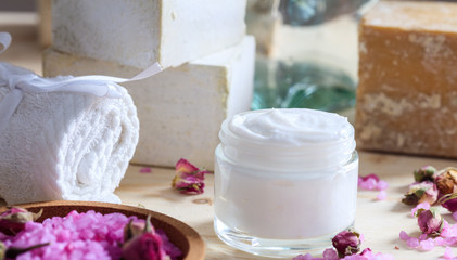 Obraz na płótnie Canvas Variety of creams and bath salt - spa concept