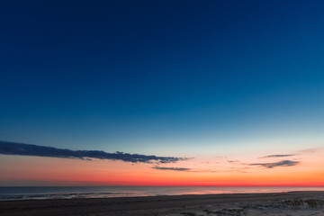 Fototapeta premium Blue cloudy sky over the Baltic sea at evening