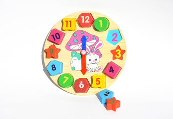 Clock toy of montessori. Montessori Learning & Education Method for Children Education. Montessori Toys and materials.