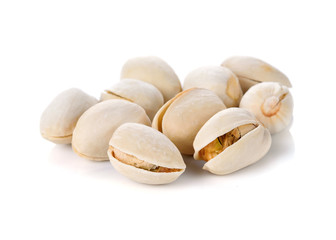 Heap of pistachios nuts isolated on white