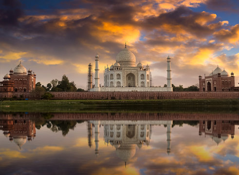 Taj Mahal along with the east  and west  gate on the Yamuna river banks at sunset. Photograph taken from Mehtab Bagh.
