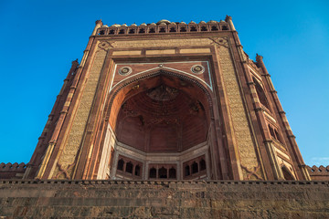 Obraz premium Buland Darwaza also known as the Gate of Magnificence built by Mughal emperor Akbar at Fatehpur Sikri Agra is classic example of Mughal Indian architecture. 