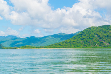 Sea shore at a paradise island with cloudy sky -the South China sea - Vietnam Nha Trang bay