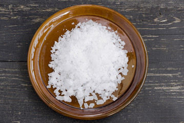 Magnesium chloride flakes, full saucer