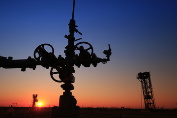 Fototapeta na wymiar Tube and valve, oil industry equipment