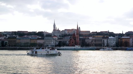 Fototapeta premium View of Matthias church and Fisheman`s bastion from Danube bank in Budapest, Hungary