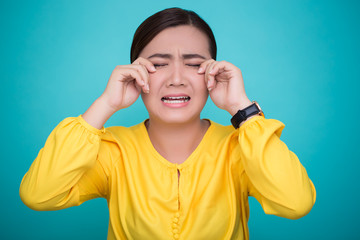 Crying woman on isolated background