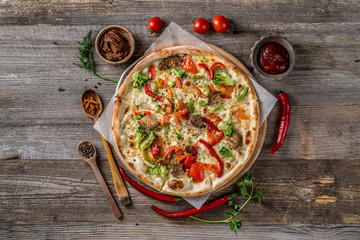 Large pizza for vegeterians with broccoli, topview