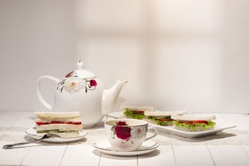 Afternoon tea table. tea set with sandwiches