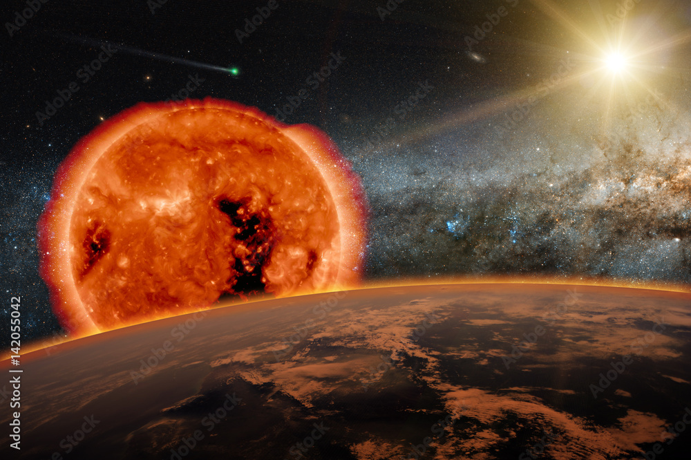 Wall mural old sun over the dark planet earth. a new star is born in the universe. a comet runs in the space. e