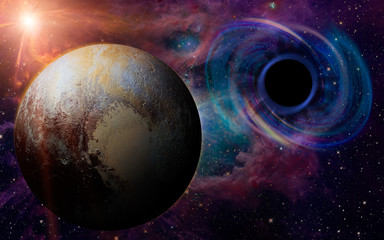 Fototapeta na wymiar Stars are collapsing in a deep spiral, attracted by the huge gravitational field of a black hole. Pluto appears in the foreground. Elements of this image furnished by NASA.