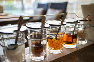 seasoning in restaurant, suger, chilli powder, vinegar, fish sauce, ground peanuts