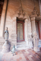 Buddhist temple door decoration in the capital of Vientiane,