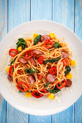 Spaghetti with vegetables and sausage