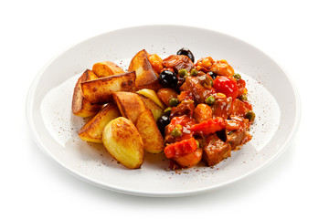 Roast meat and baked potatoes