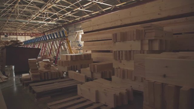 LVL Laminated Veneer Lumbe. Large hangar with the production line for wood. Wood Factory general plan: the production of laminated veneer lumber. Workshop for production of laminated veneer lumber.