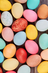 Many Easter eggs. Colorful chicken eggs, top view.