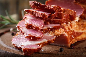 Smoked bacon with chopped slices, ready to prepare a traditional breakfast with eggs