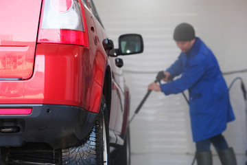 Car in a car washing station