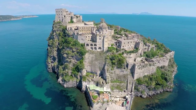 Italian tourist attraction, medieval Aragonese Castle in Ischia, aerial view