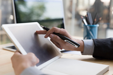 businessman watching something on digital tablet in office