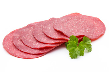 Salami smoked sausage one slice isolated on white background cutout.