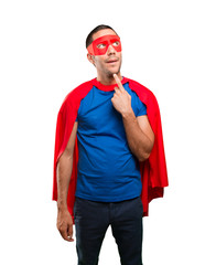 Astonished superhero thinking