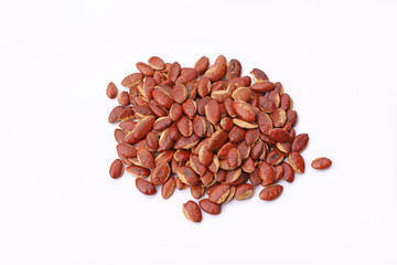 Roasted kayu seeds on white background (Irvingia malayana benn)