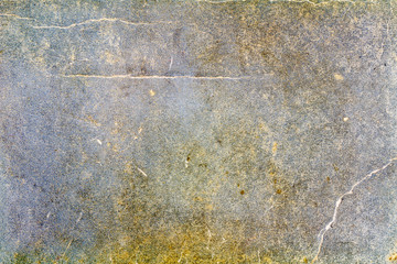 Fragment of old blue paper texture with cracks. Abstract background