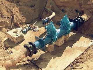 Reconstruction of main City water supply pipeline in underground.