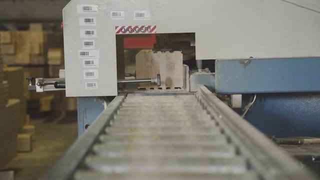 The production line for wood. Woodworking industry: machinery and equipment for cutting and grinding lamellae. Production of laminated veneer lumber.LVL Laminated Veneer Lumbe.