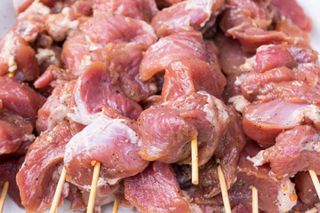 Raw pork skewers