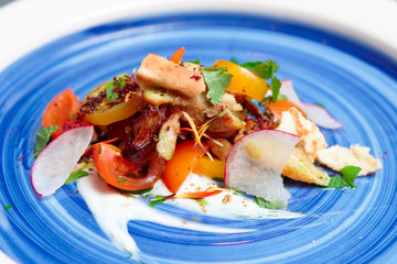 Chicken salad on blue plate