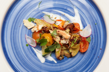 Chicken salad on blue plate