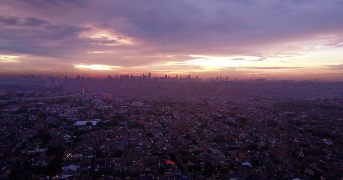 Video footage of top view of private residence in Jakarta. Shot at sunset time with skyscraper view. Professional shot in 4K resolution