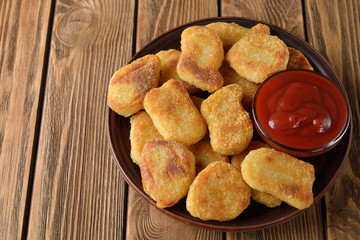 Chicken nuggets with ketchup