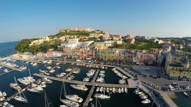 Santa Maria della Pieta church on Marina Grande square, private boats docked