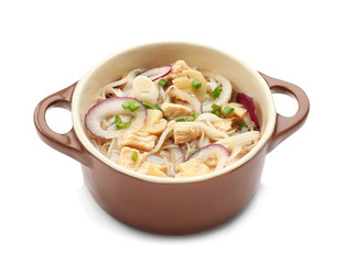 Chicken noodle soup in pot on white background