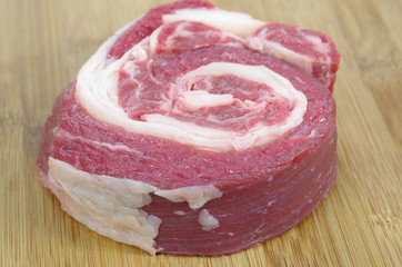 coiled raw beef