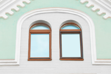 Vintage building and windows with brick wall background