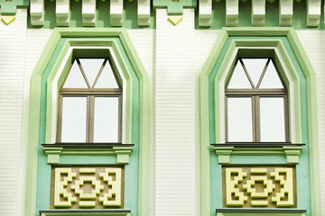 Arched windows with brick wall background